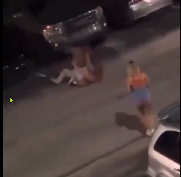 Violent street attack of man and woman.